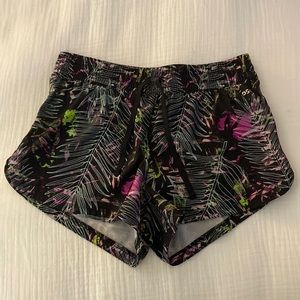 DSG Stride women’s running shorts, floral pattern